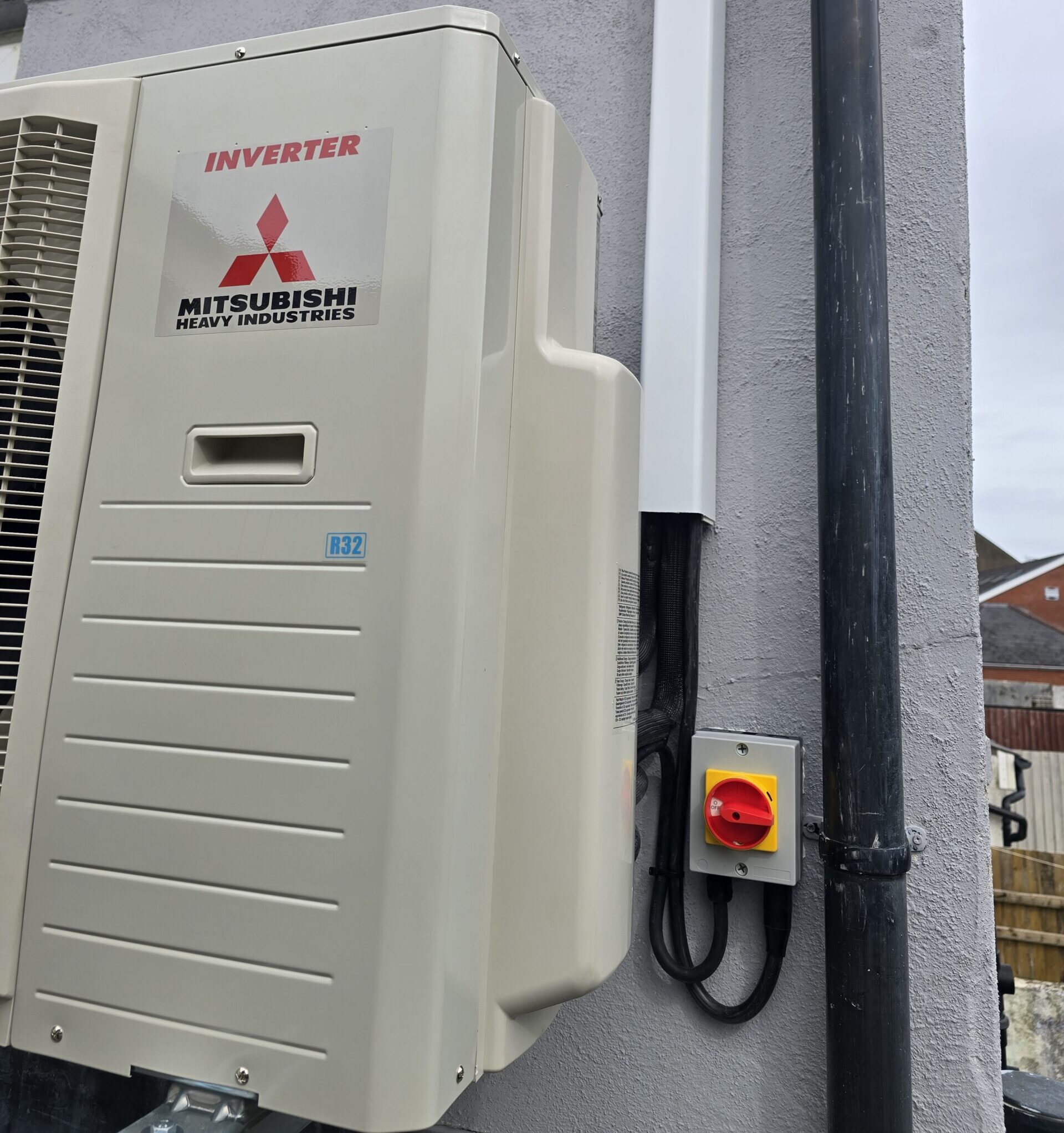 Outdoor AC unit electrical supply installation with local isolator by CAG Electrical Ltd